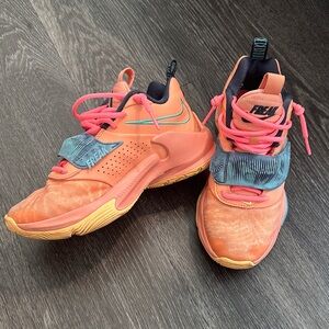 Nike Freaks Kids' Vibrant Orange and Teal Sneakers